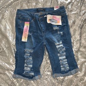 Medium dark distressed shorts